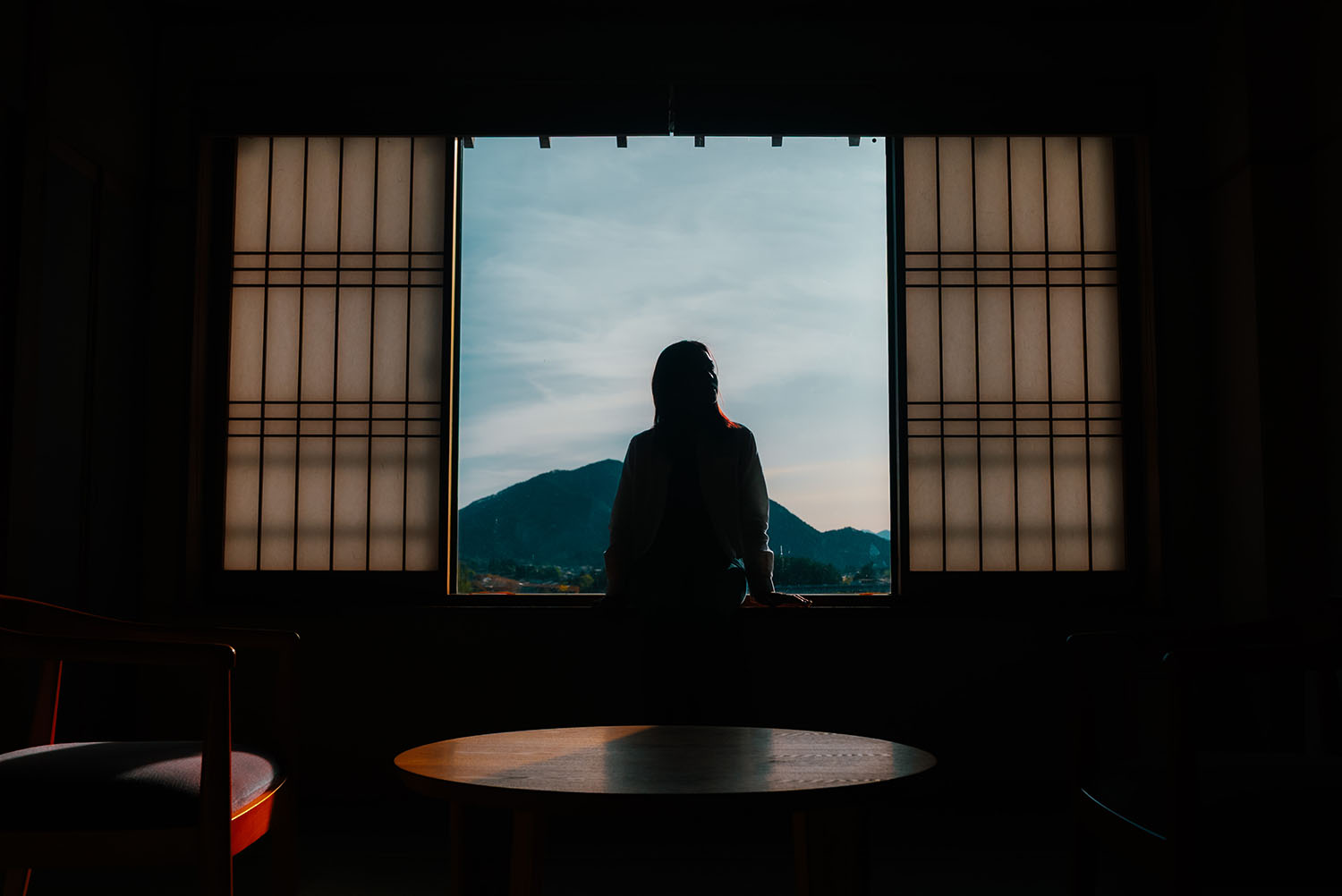 A woman relaxing at Asafuji, a hot spring hotel in Fuji Kawaguchiko.